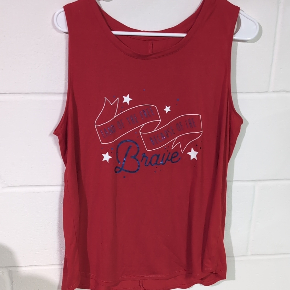 Red Tank Top With Saying Land Of The Free Because Of The Brave